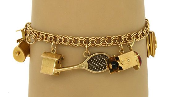 VINTAGE 14K GOLD LADIES MOVABLE CHARM BRACELET  