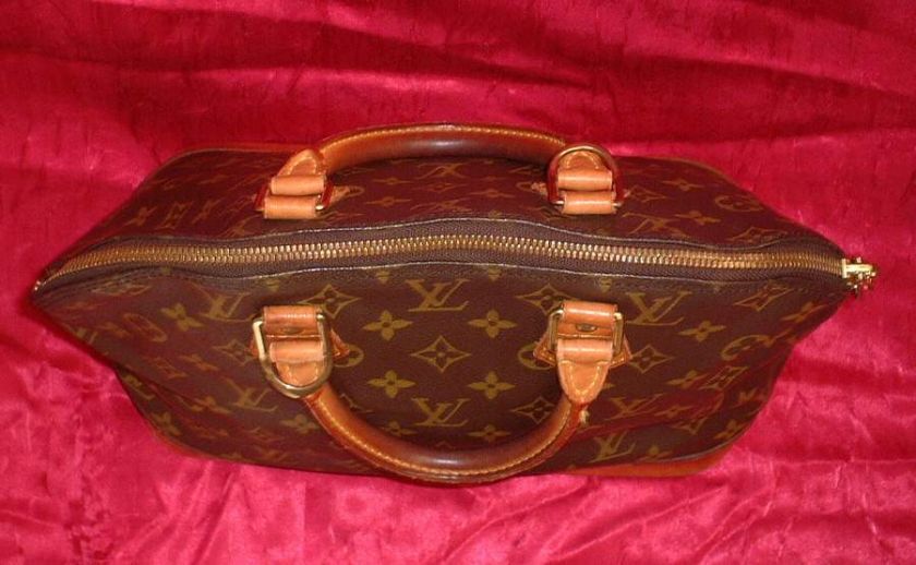 Louis Vuitton Alma hand bag authentic is guaranteed   