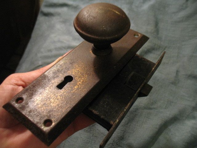 ANTIQUE DOOR KNOB LOCK PLATE original 1850 copper brass  