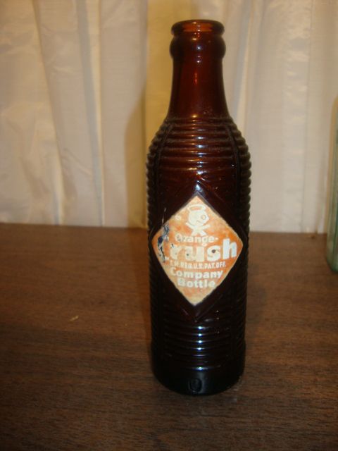 ANTIQUE AMBER ORANGE CRUSH SODA BOTTLE,RARE,WHITE LETTERING ON BACK 