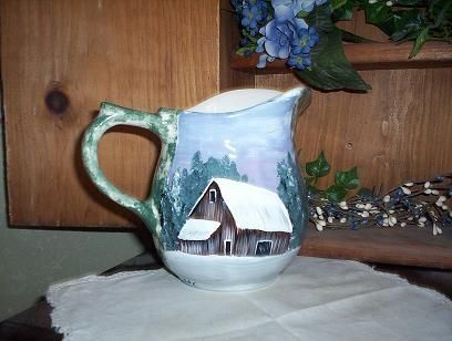 Ceramic Spongeware pitcher w/ hp winter barn scene  