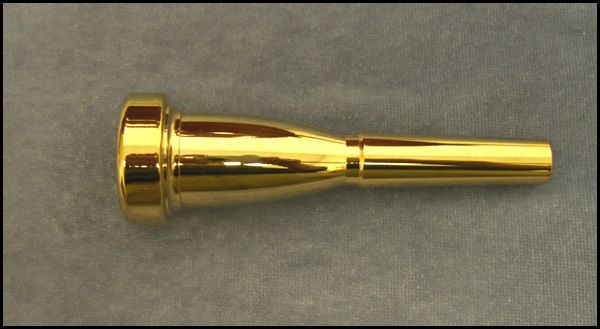 This heavier gold plated trumpet mouthpiece (5C) darkens the sound 